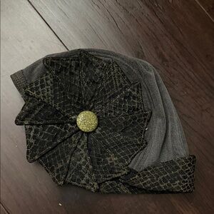Elegant Black and Gold Flower Accent Women's hat